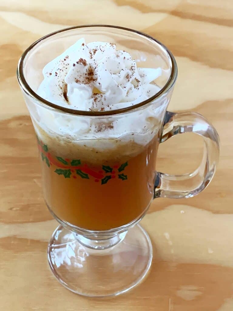 Hot Buttered Rum with Apple Cider and Whipped Cream