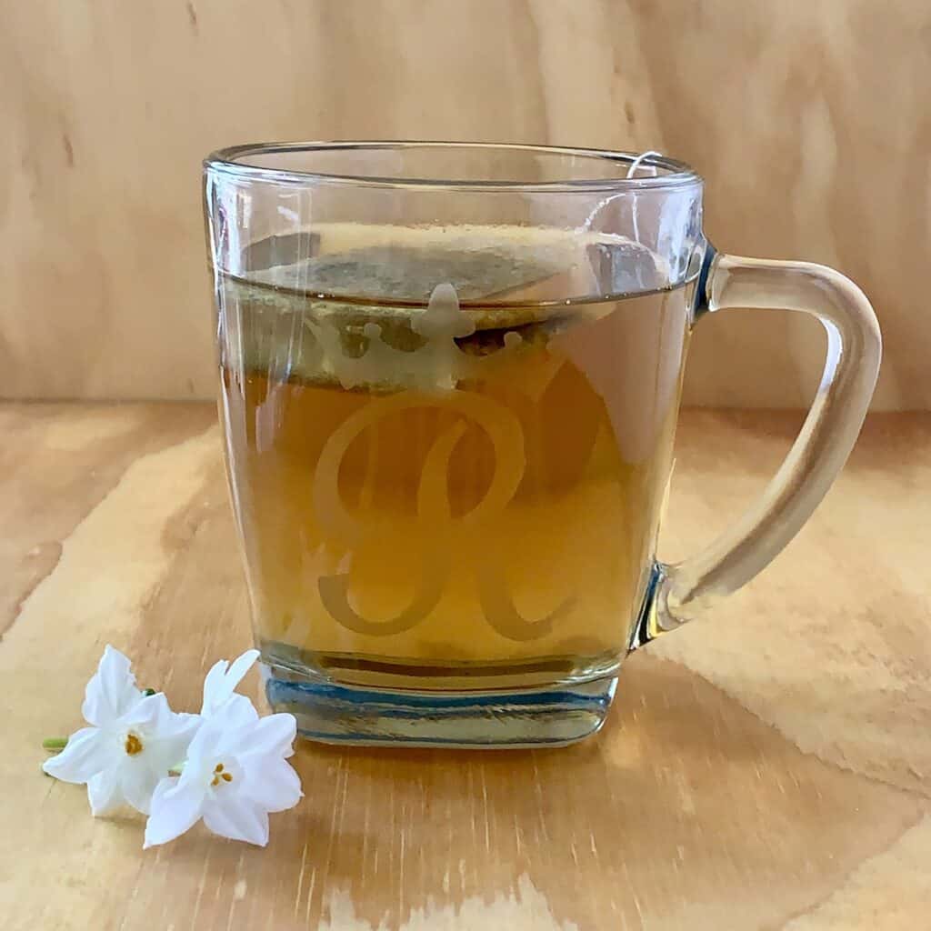 Steeping chamomile vanilla tea in a clear glass mug