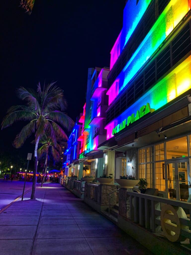 Colorful restaurants in South Beach at night along Ocean Drive