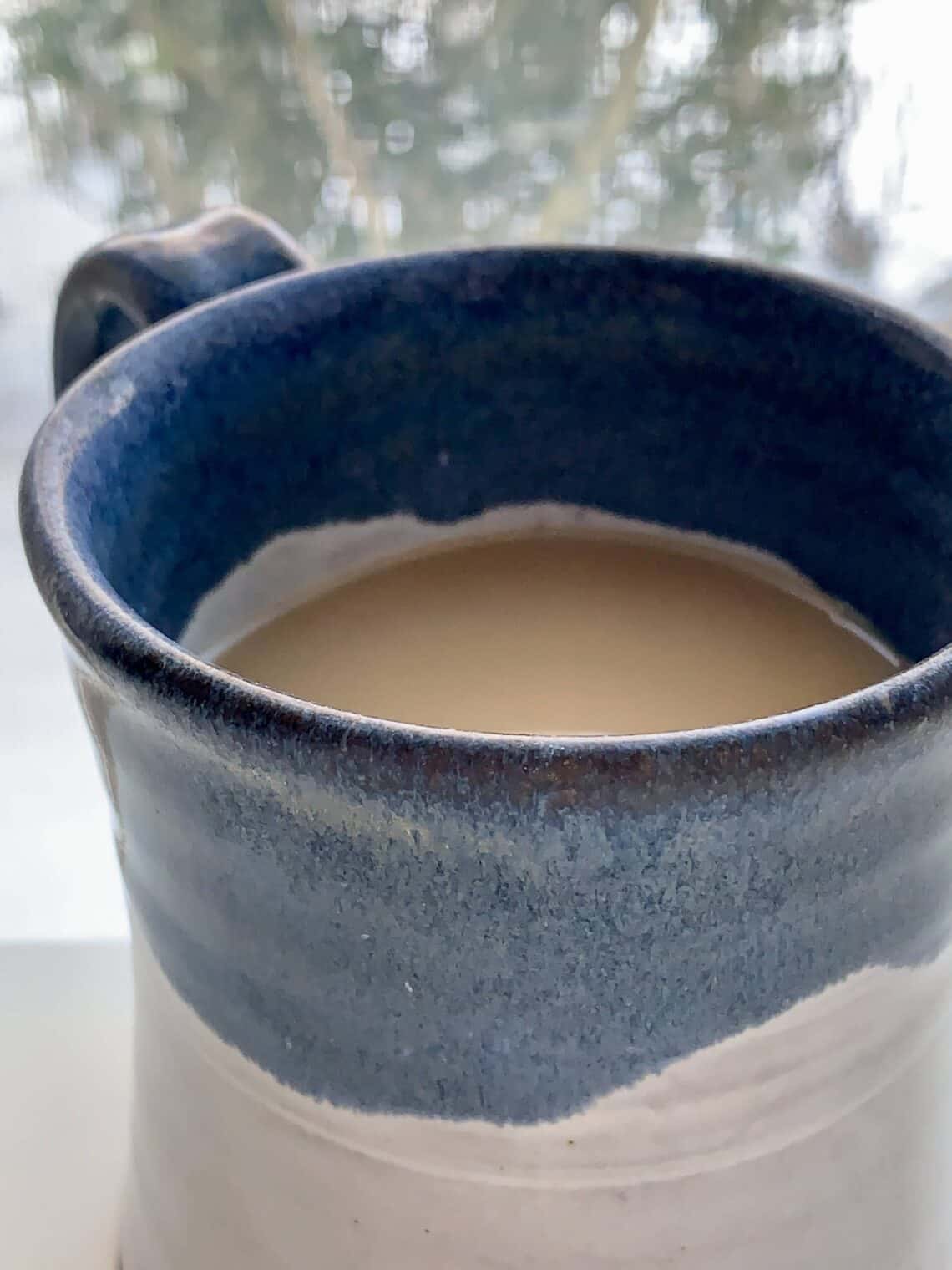 London Fog, Earl Grey Tea Latte in a blue and white mug