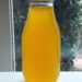 Homemade mandarin orange simple syrup recipe made in a glass bottle