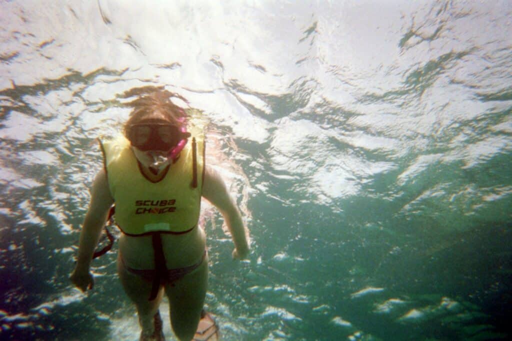 A woman snorkeling in the Caribbean