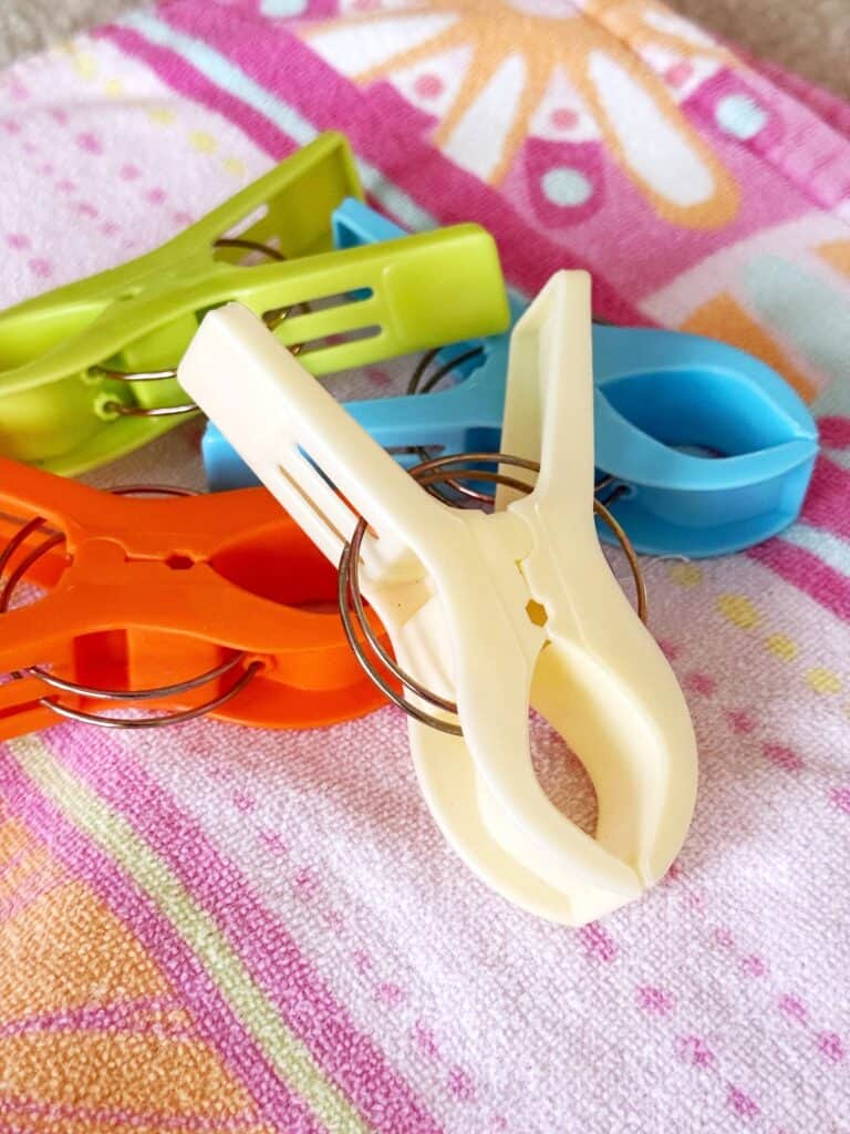 Colorful towel clips to pack for a cruise